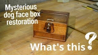 Mysterious dog face box restoration