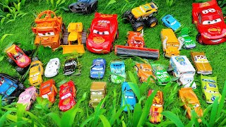 Finding Disney Pixar Cars on Green Grass : Lightning McQueen, Tow Mater, Miss Fritter, Chick Hicks