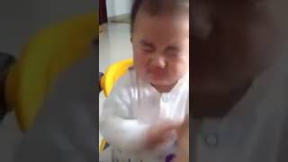 Cute Kid tasting lemon