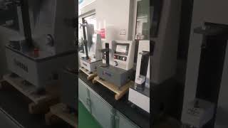 Spring load testing machine