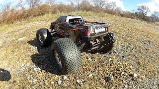 Hpi Savage XL tearing around offroad.