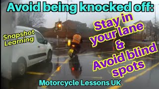 Avoid being knocked off: keep out of blind spots & stay in your lane.