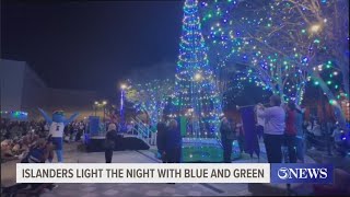 Islanders light the night with blue and green!