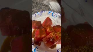 Trying the viral snack: Watermelon 🍉 fruit roll up & chamoy #watermelon #chamoy #viralsnacks