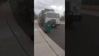 Waste Management Garbage Truck Picking Up A OverFilled Container 8/14/2023