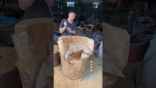 Carpenter's craft of making creative chair from tree roots