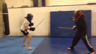 Joe and Stu low armour stick sparring