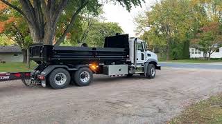 2022 MACK GRANITE ROLLOFF AND 2022 FELLING TAG TRAILER  GOING TO HAUL ITS FIRST LOAD