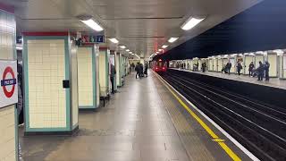 Why not is fast District line S7 Stock Departing at Mile End