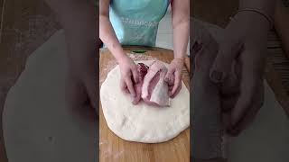 The Process Of Stuffing Pork Into Bread