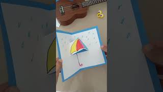 pop up card umbrella in the rain