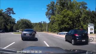 Cyclist in bike lane cut off and hit.. chase ensues