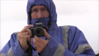 On the beach in the rain