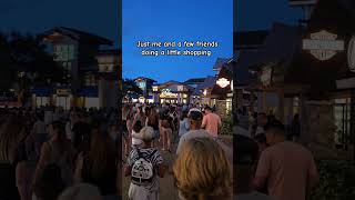 A river of people flowing through Disney Springs