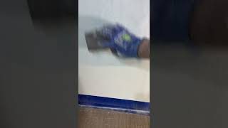 Sanding a drywall patch