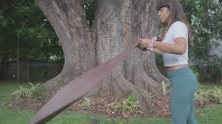 Woman unrolling her yoga mat