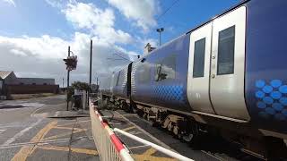 Scotrail class 380001 at Ardrossan level crossing. 5/9/24.