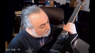 Unboxing , setup, and review of Donner's take on the Les Paul style guitar: the Donner DLP 124B.