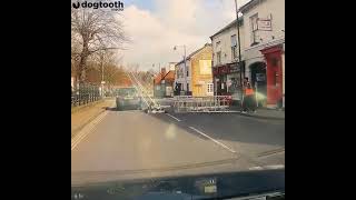 Scaffolding Collapses and Workers Fall 25 FEET Onto Busy Road || Dogtooth Media