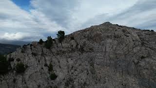 Flight, aerial view from drone to mountain peaks of Dolomites Italy