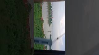 Viral Video: Stunning Ganga River View from Moving Train! [2024]  #shortsfeed #shorts#trending#viral