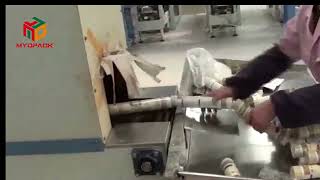 Paper wrapped noodles heat shrink packaging machine