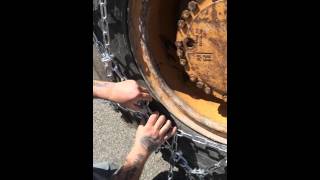 TND Loader Grader  Diamond Tire Chains Installation