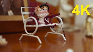 4K Free Stock Footage: Dolls, Couple on a Bench