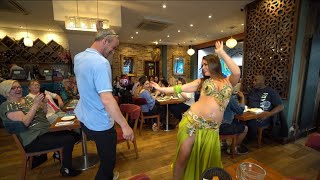 Turkish Belly Dancer With People In Turkuaz Restaurant London