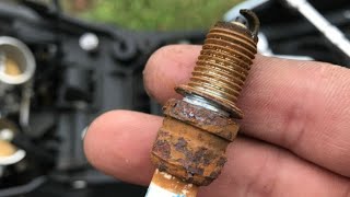 How to remove seized spark plug