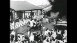 Swahili tribesmen riding Ferris wheels and merry go rounds in Mombasa Kenya 1909