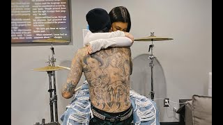 Kourtney Kardashian Sweetly Hugs Travis Barker In New BTS Photos Of MGK’s Tour