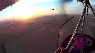 Sunset Formation Flying with Approaching Thunderstorm