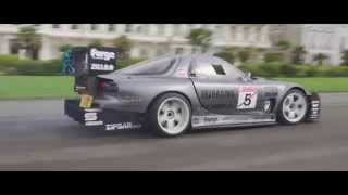 Noise-making V8 RX7 LS7 entering and exiting a show