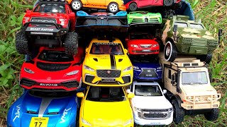 Box Full of Model Cars/Bugatti Bolide, Lamborghini URUS, Lxus Nx200t, Toyota Land Cruiser, Welly Car