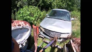 Ford 3600 dragging a junk honda van.  Harder than first thought.