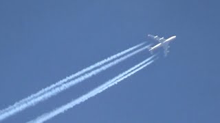 Cargolux Boeing 747-4HAF(ER) [LX-LCL] flying overhead at 37,000 ft producing contrails