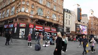 Leicester Square London, street singer entertains the crowds, 'Under the Boardwalk', September 2024.