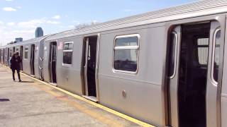 Astoria - Ditmars Boulevard-bound Q train at Broadway