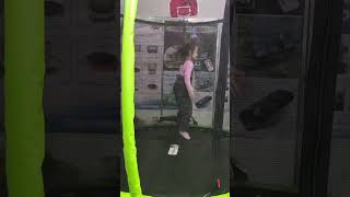 Exhibition Playtime: Adorable Little Girl Joyfully Bouncing and Having Fun on Our Trampoline!