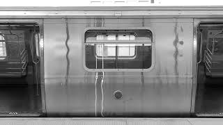 Rockaway Park Shuttle train at Beach 98th Street-Holland (black and white)