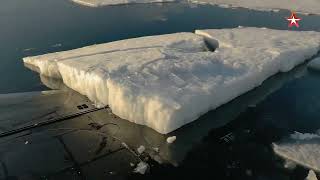 Submarine Surfacing Through Ice.The Knyaz Vladimir Borei A-class nuclear submarine of project 955A.