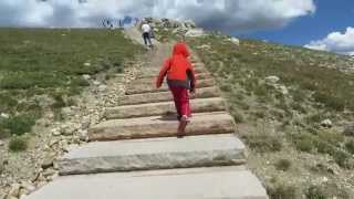 Radek climbing the stairs at the top of RMNP