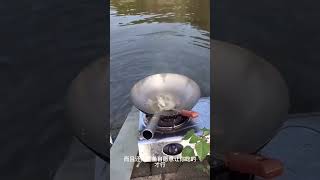 Cooking the freshest fish from the pond