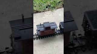 Running the 1990 aristocraft rea Pennsylvania alco fa-1 on the g scale loops with 2 hoppers