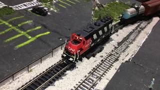 A Typical switching job of CN in N Scale! Atlas gp38 switches local industries on my layout!!