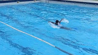 He tries to Free a butterfly in a 25 meter pool.