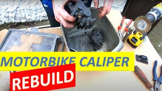 Motorbike brake caliper service