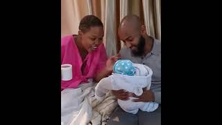 Mitchel and Her Husband very happy about their baby R.//Happiness .