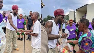 Burna boy Sharing Food to the Needy